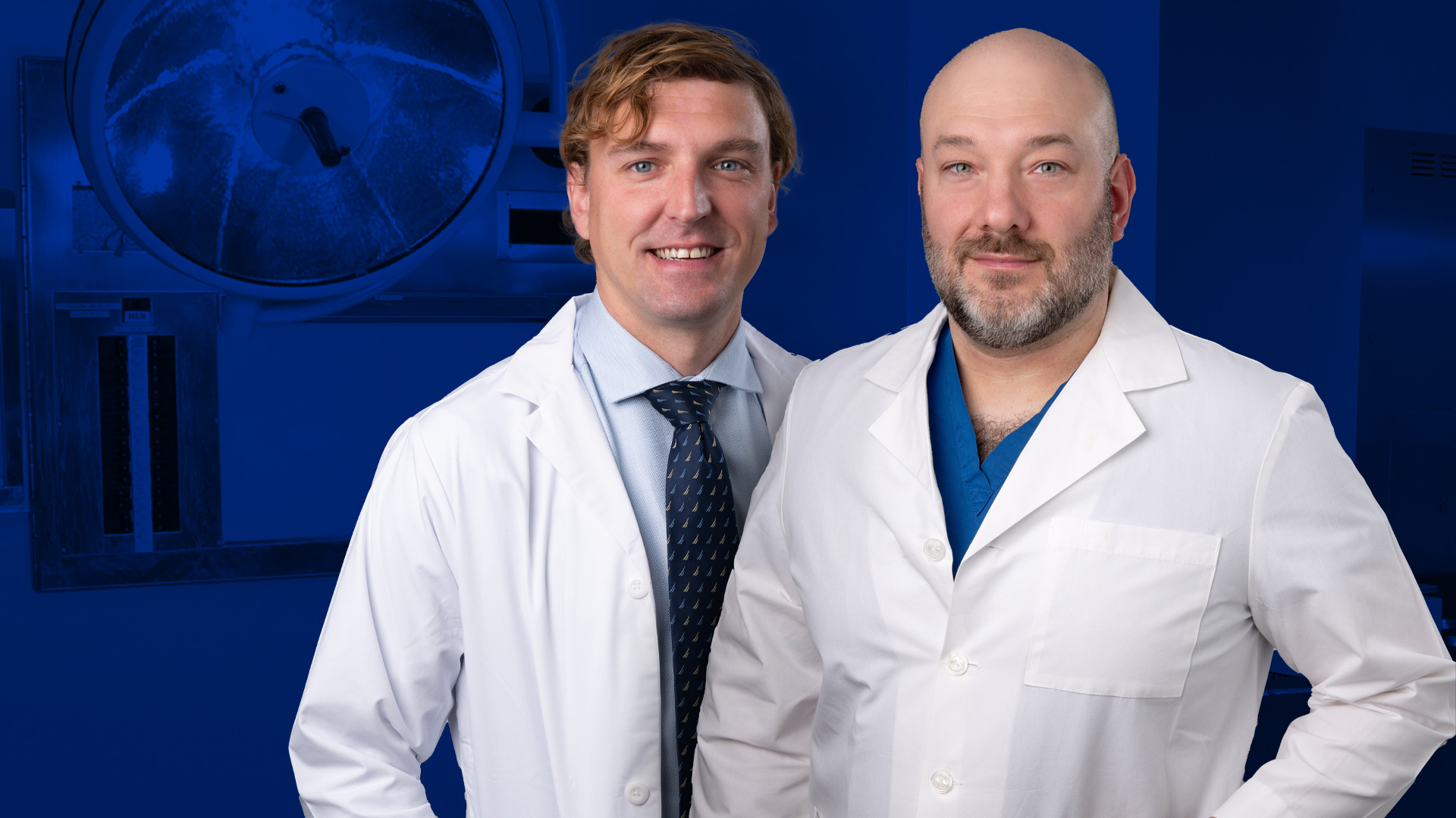 2 men in white lab coats